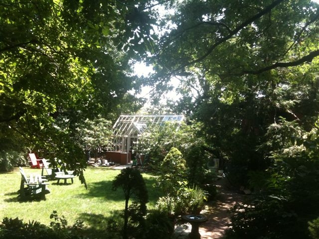 Wide-long-shot-of-Lee-back-yard-with-greenhouse